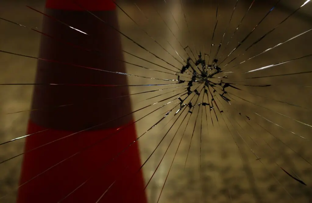 A window with a crack in the glass pane