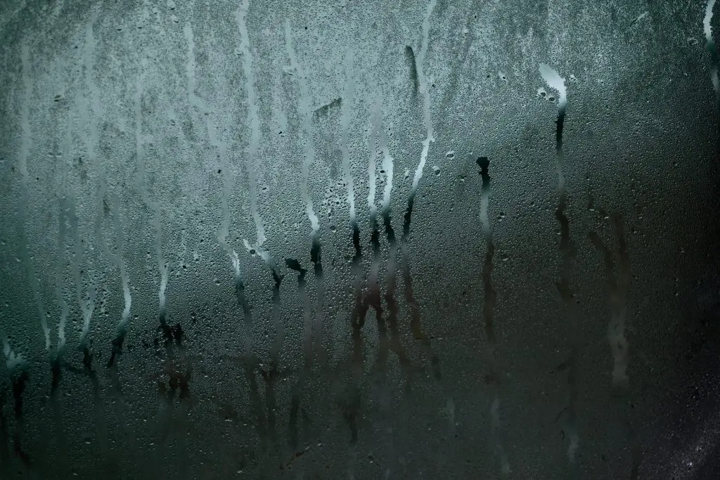 Image of steamed glass with condensation on the window.