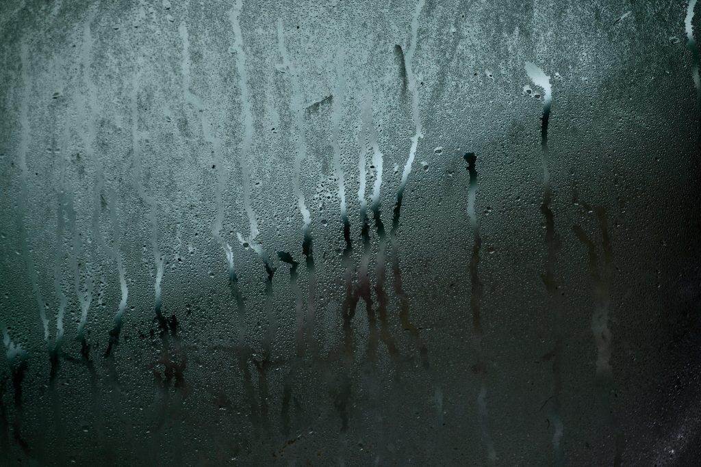 Image of steamed glass with condensation on the window.