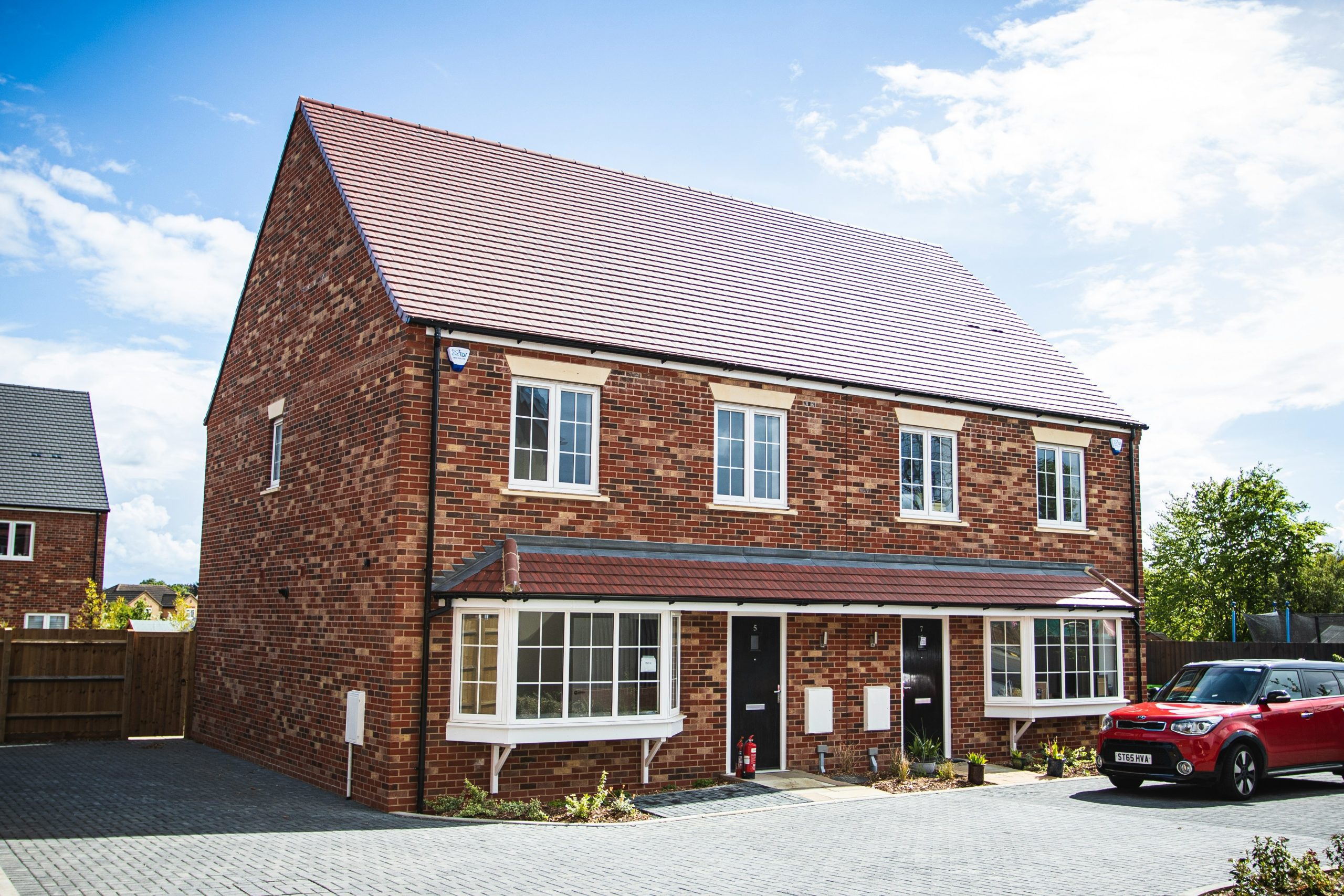 Image of semi-detached houses with locked windows and doors.