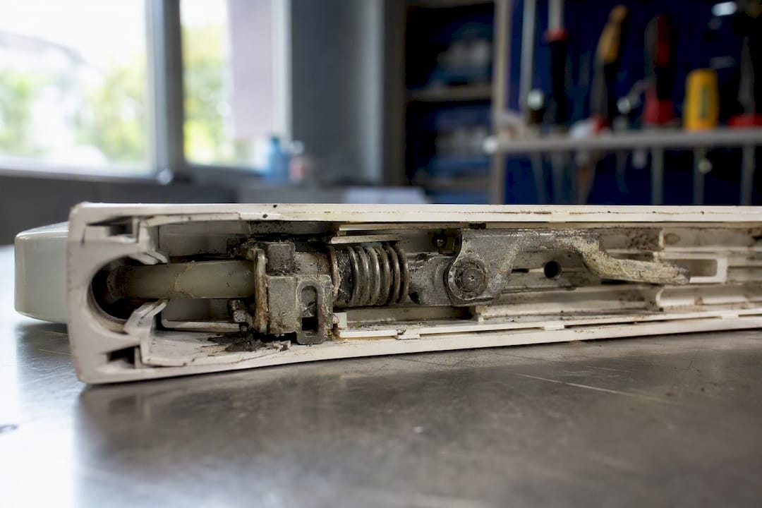 Worn spring cassette inside uPVC door handle mechanism