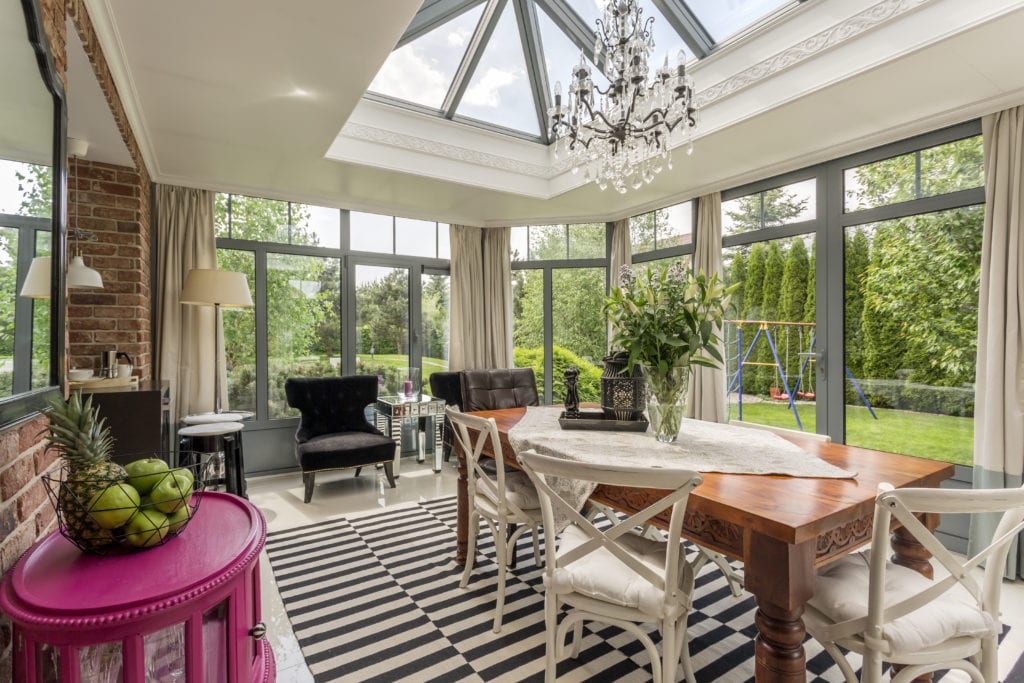 Glass elegant chandelier in creative conservatory or sunroom